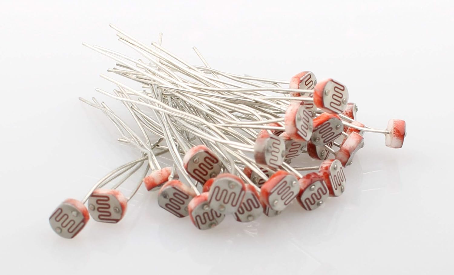 Set 20 Fotorezistori GM5539 de 5mm si 20 diode laser modul mini red 5V, 6mm, tensiune maxima 150V DC, temperatura de functionare -30 - +70 grade Celsius, din cupru