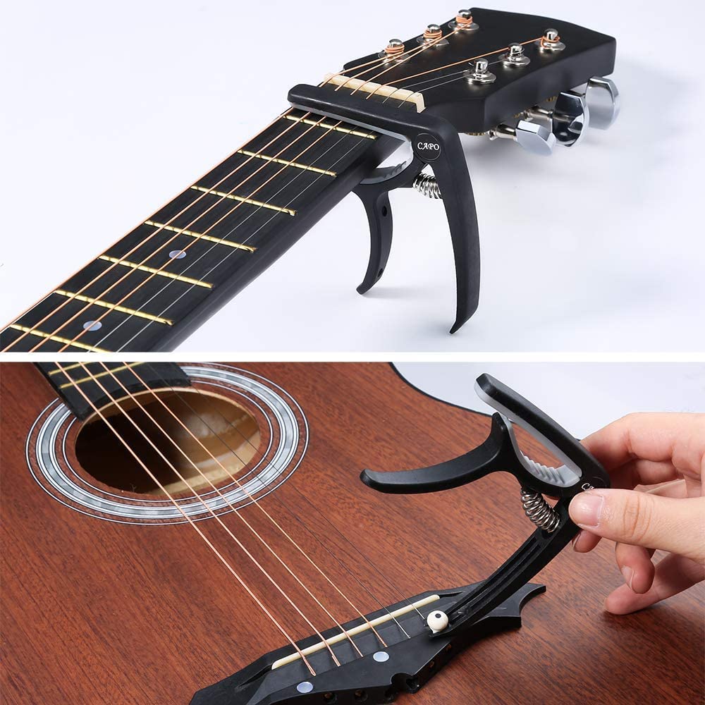 Set de accesorii pentru chitara 60 de piese, cu tuner, capodastru, string winder, corzi pentru chitara, pini, pene, protectii pentru degete, pene tip gheara